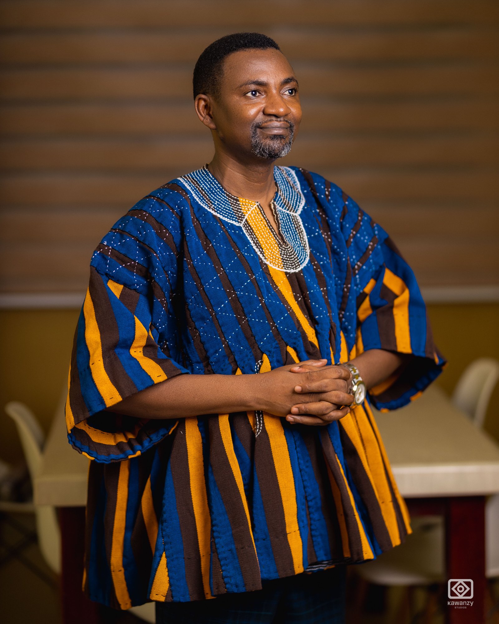 Barima in blue and brown smock