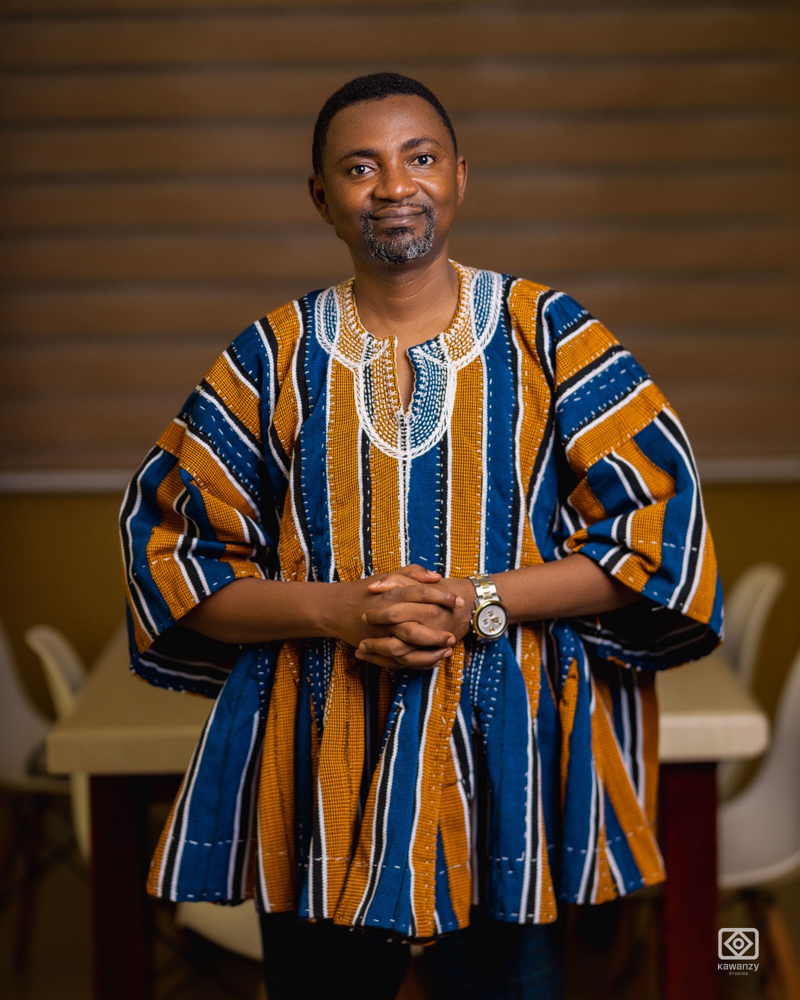 Barima in blue and gold smock